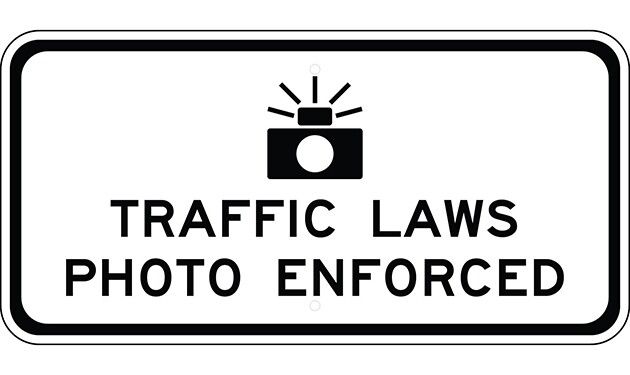 photo enforced sign meaning